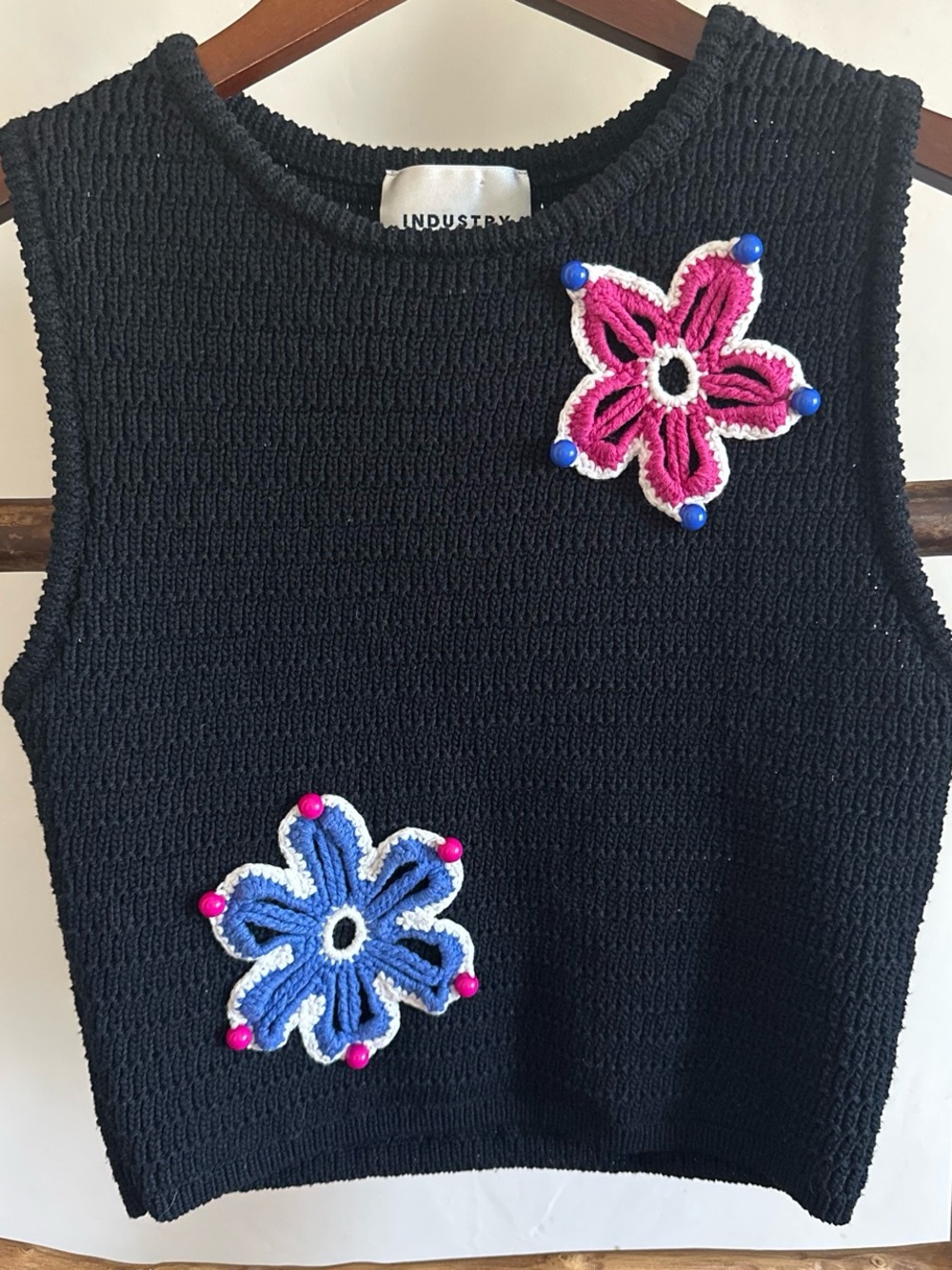 Black Knit Floral Appliqué Sleeveless Top by INDUSTRY